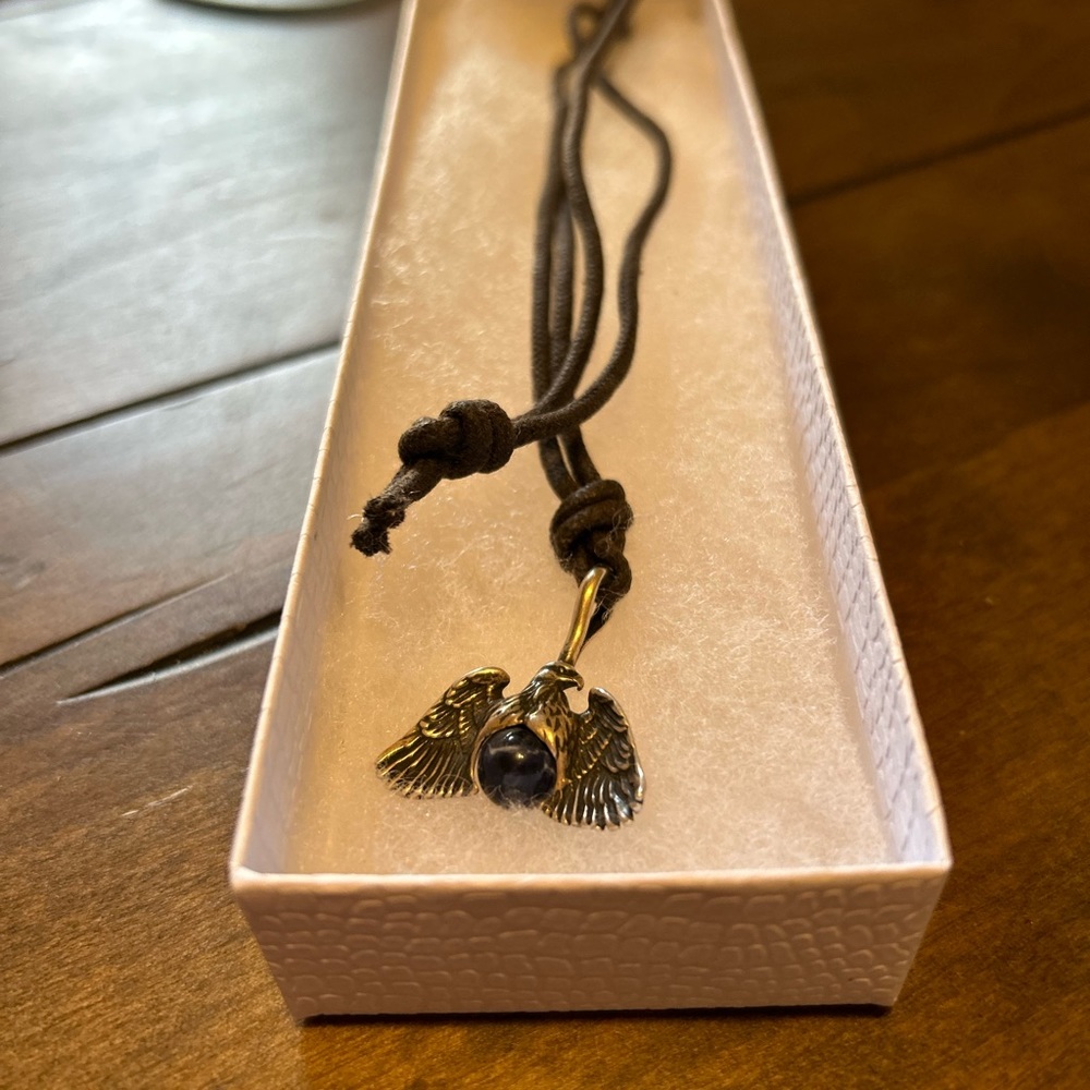 ICC Native American Eagle with Moving Sodalite Sphere Sterling